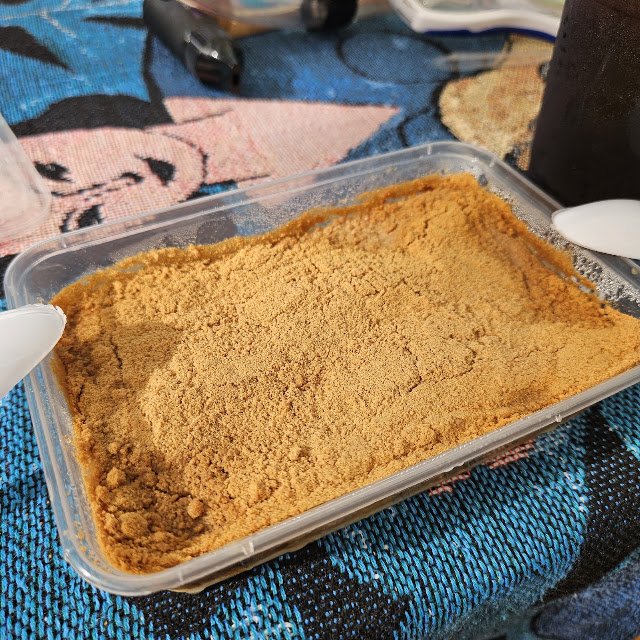 Dominggo Cafe (Napaling) · Mango Float 表层（饼干碎与奶油，芒果夹在层间）